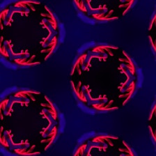 A vibrant, swirling kaleidoscope pattern glowing on a digital screen with hands adjusting controls nearby.