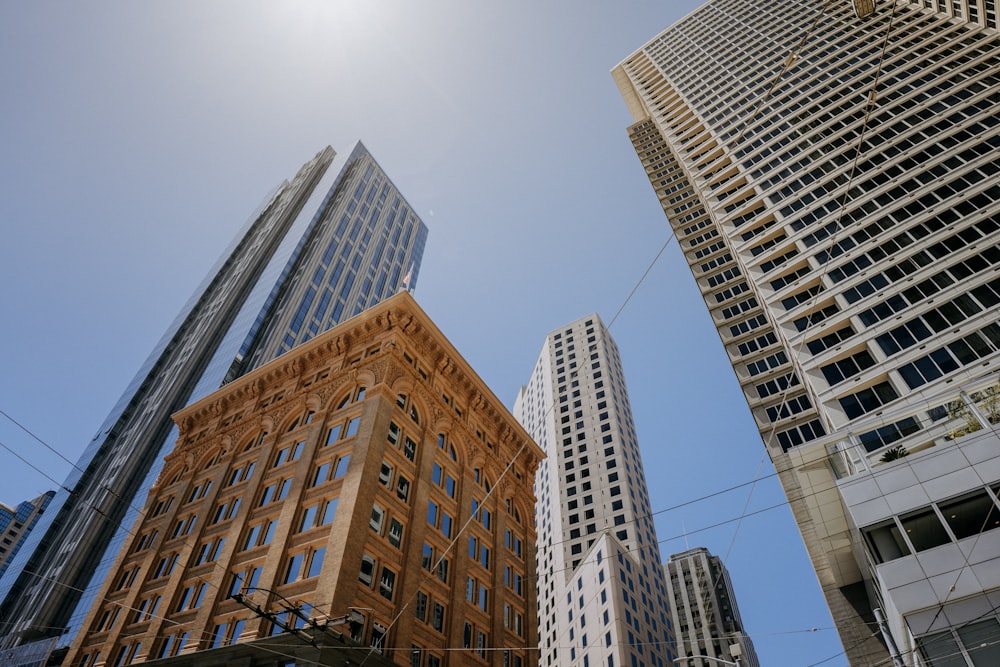 a group of tall buildings sitting next to each other