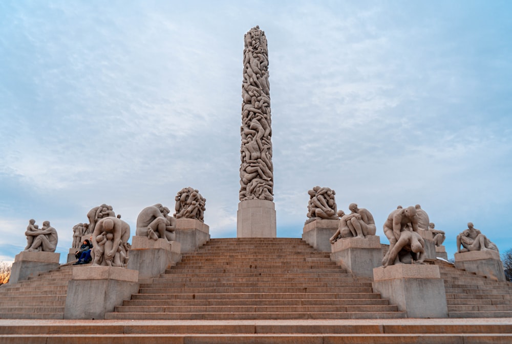 a large monument with many statues on top of it