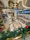 Elegant corporate holiday event featuring Santa Brent engaging warmly with guests in a luxurious lodge setting.