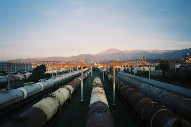 a train yard filled with lots of train cars