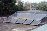 An image showing a solar energy collector on a rooftop.