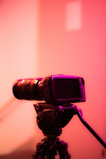 a camera on a tripod in a room