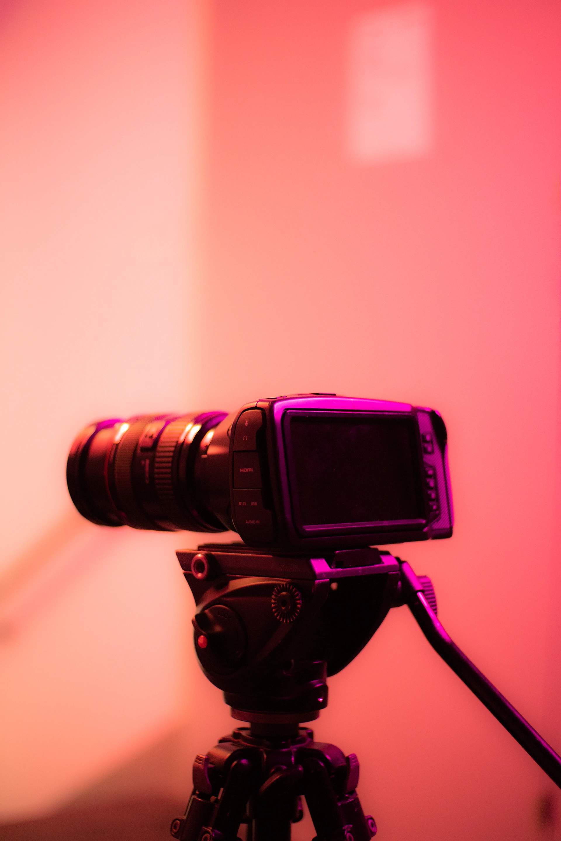 a camera on a tripod in a room