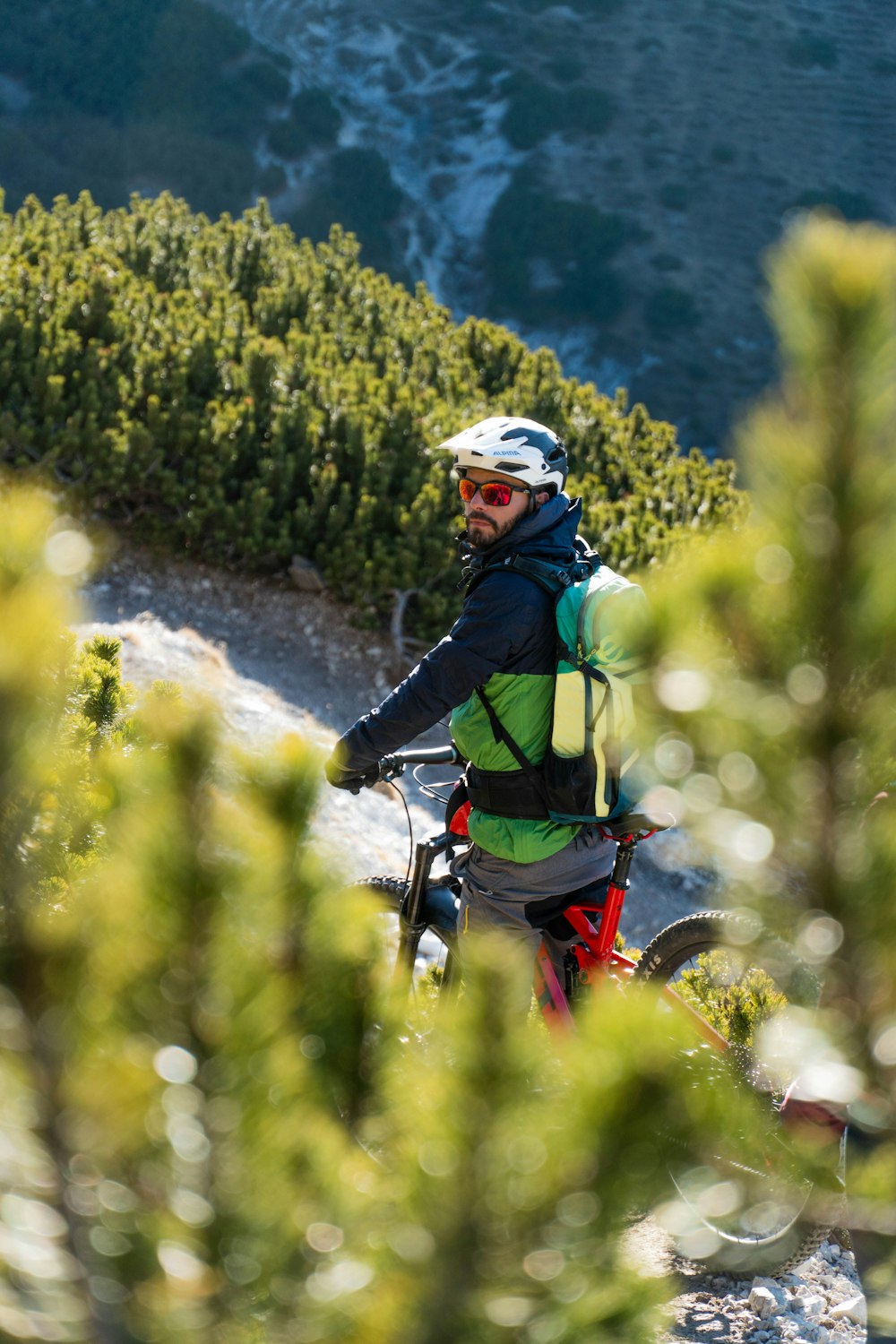 a man riding a mountain bike on a trail