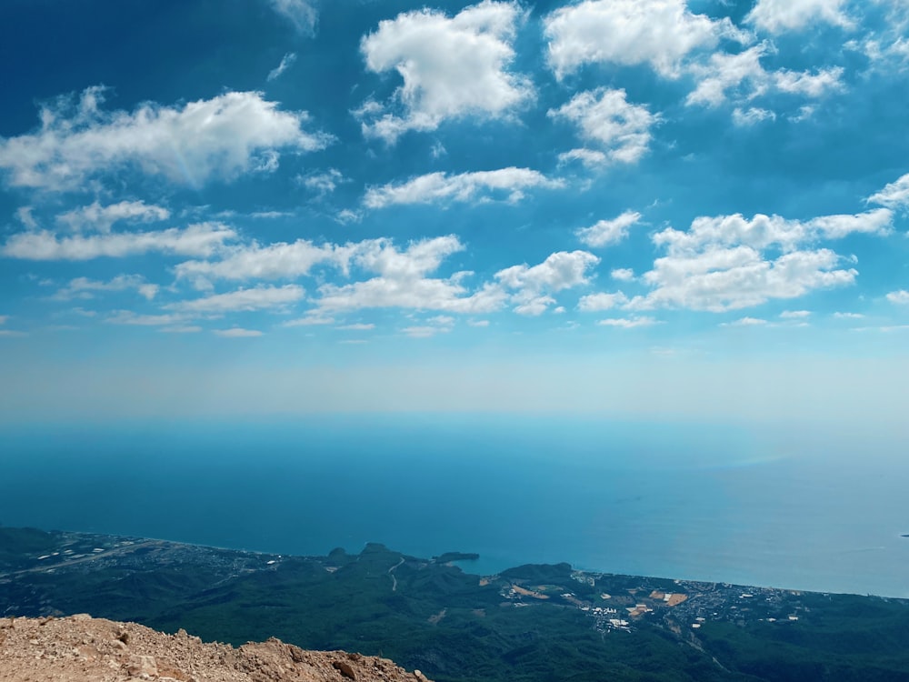 a view of the ocean from the top of a mountain