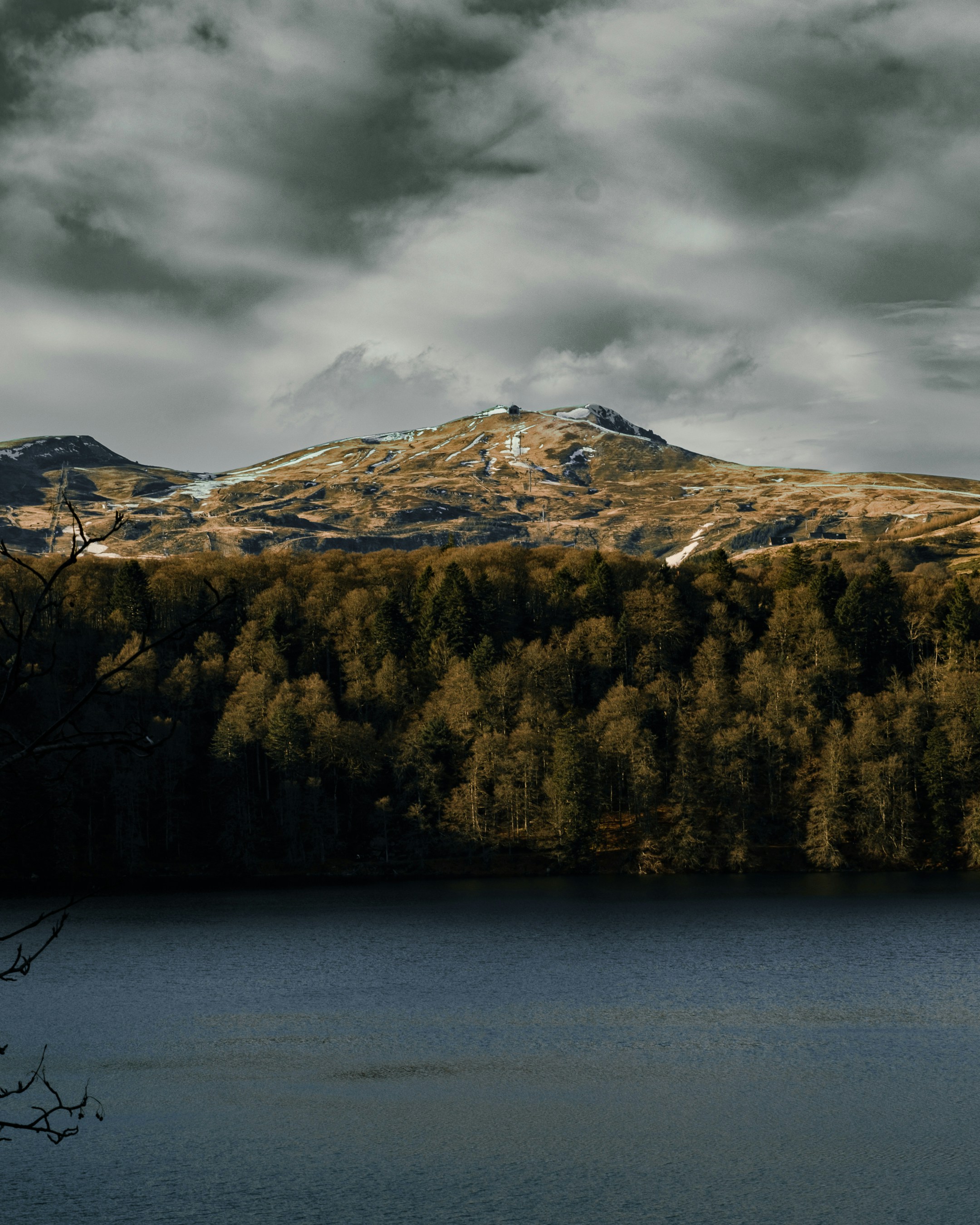 a lake with a mountain in the background