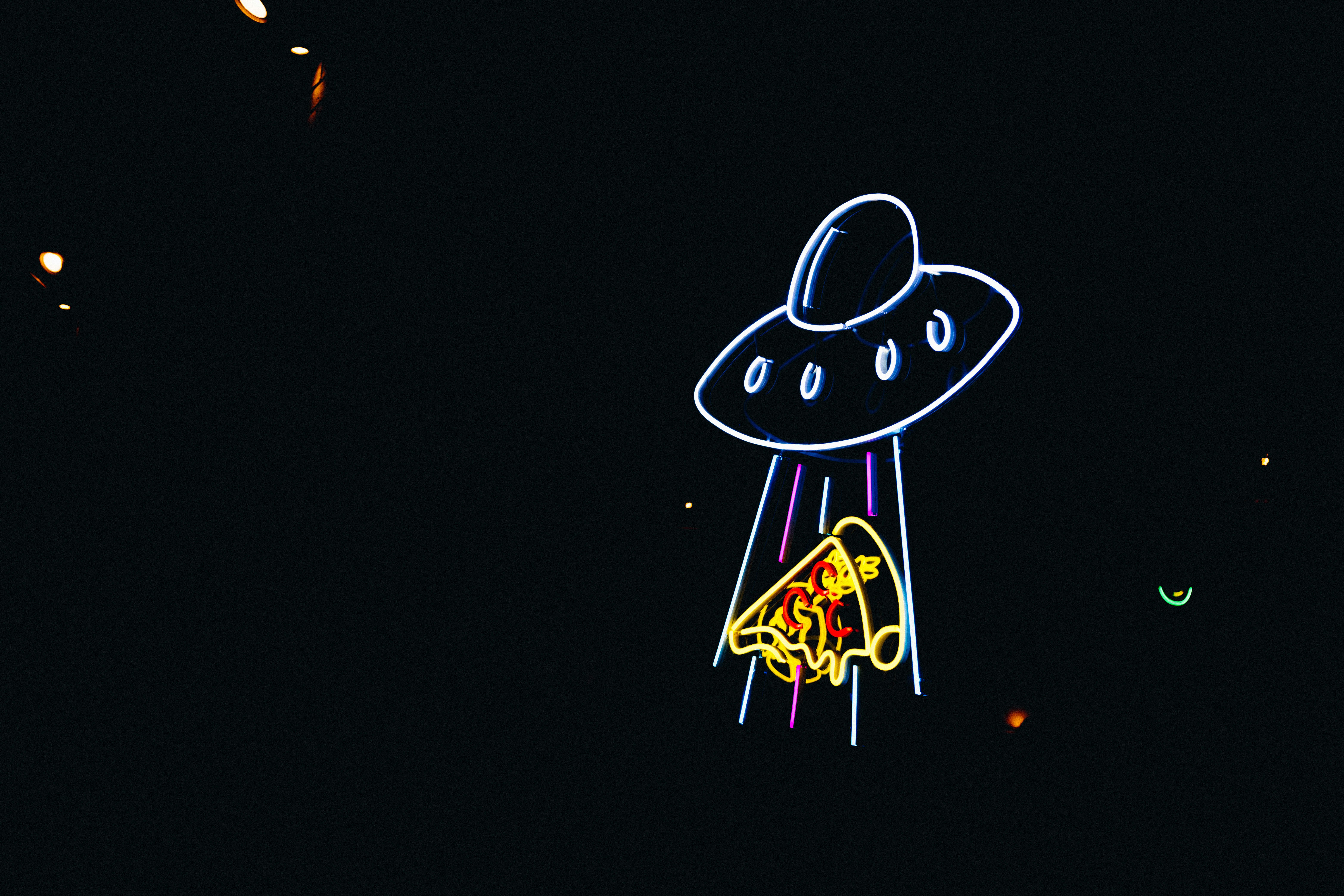 Neon space pizza sign
