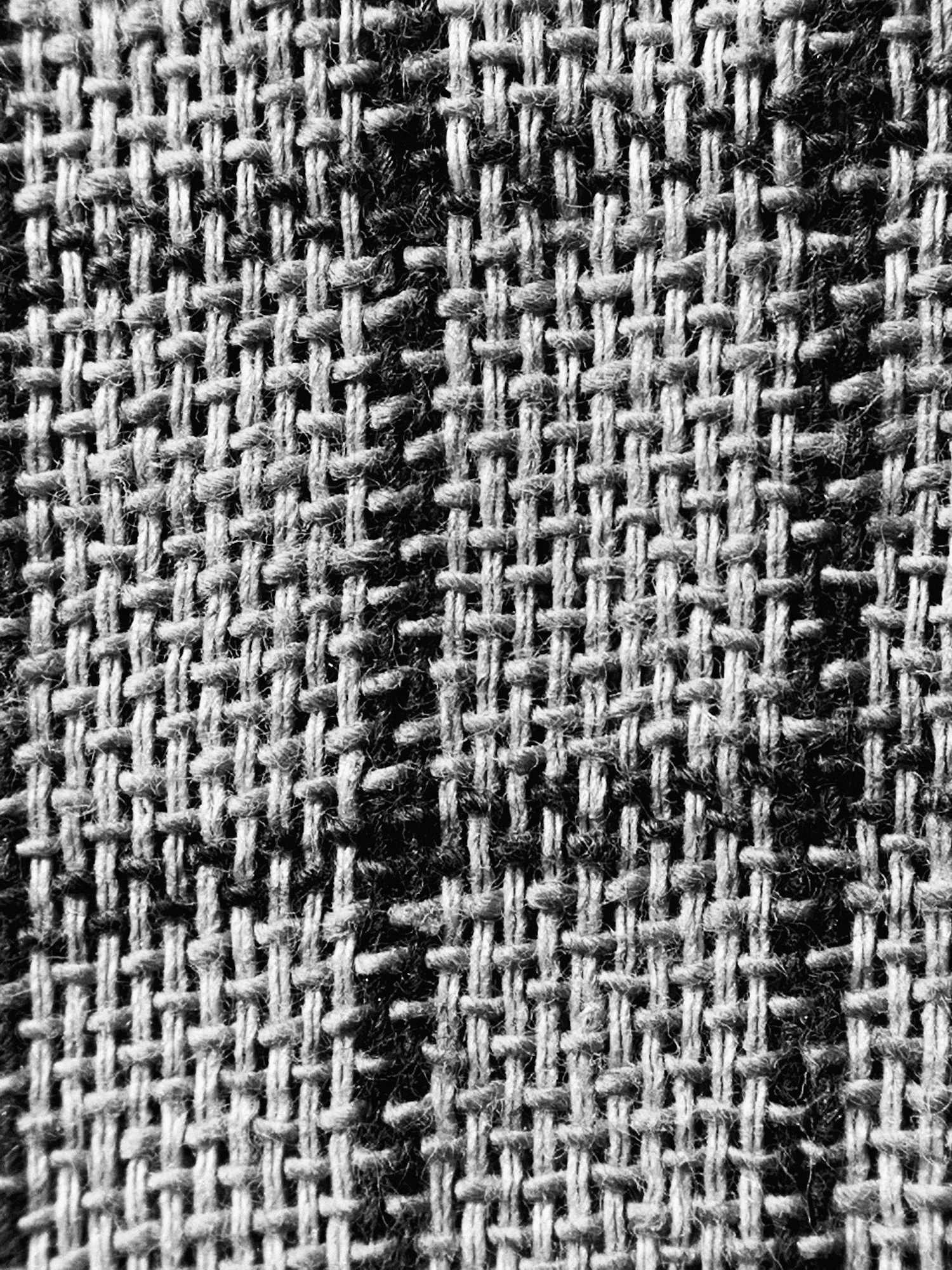 A striped herringbone weave cropped to a narrow horizontal band