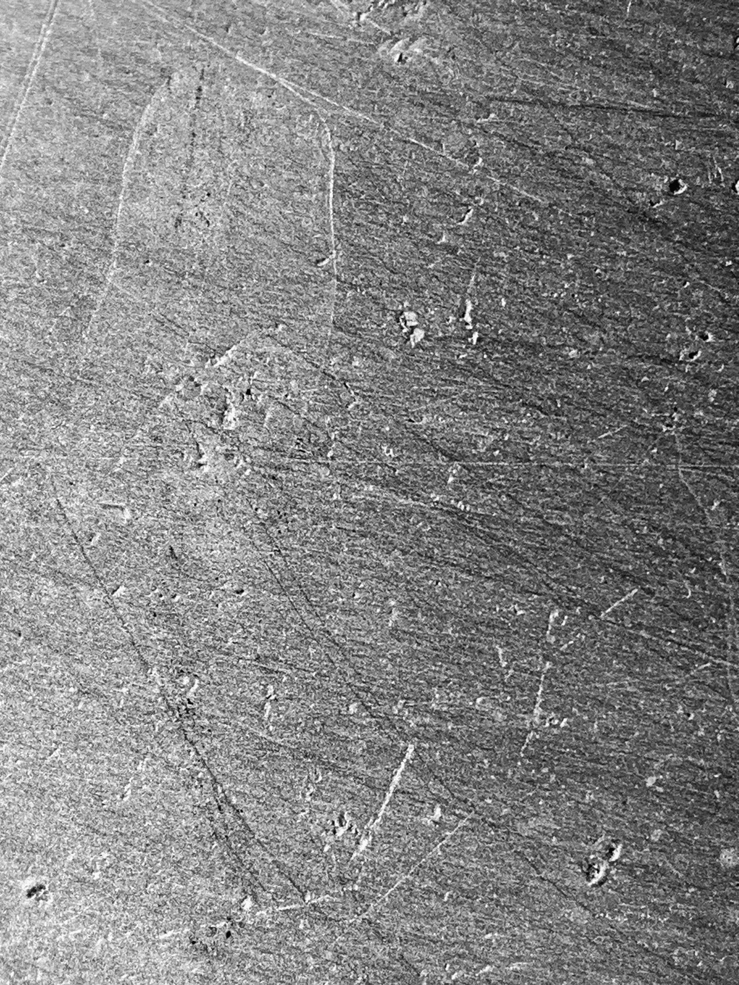 a black and white photo of a piece of wood