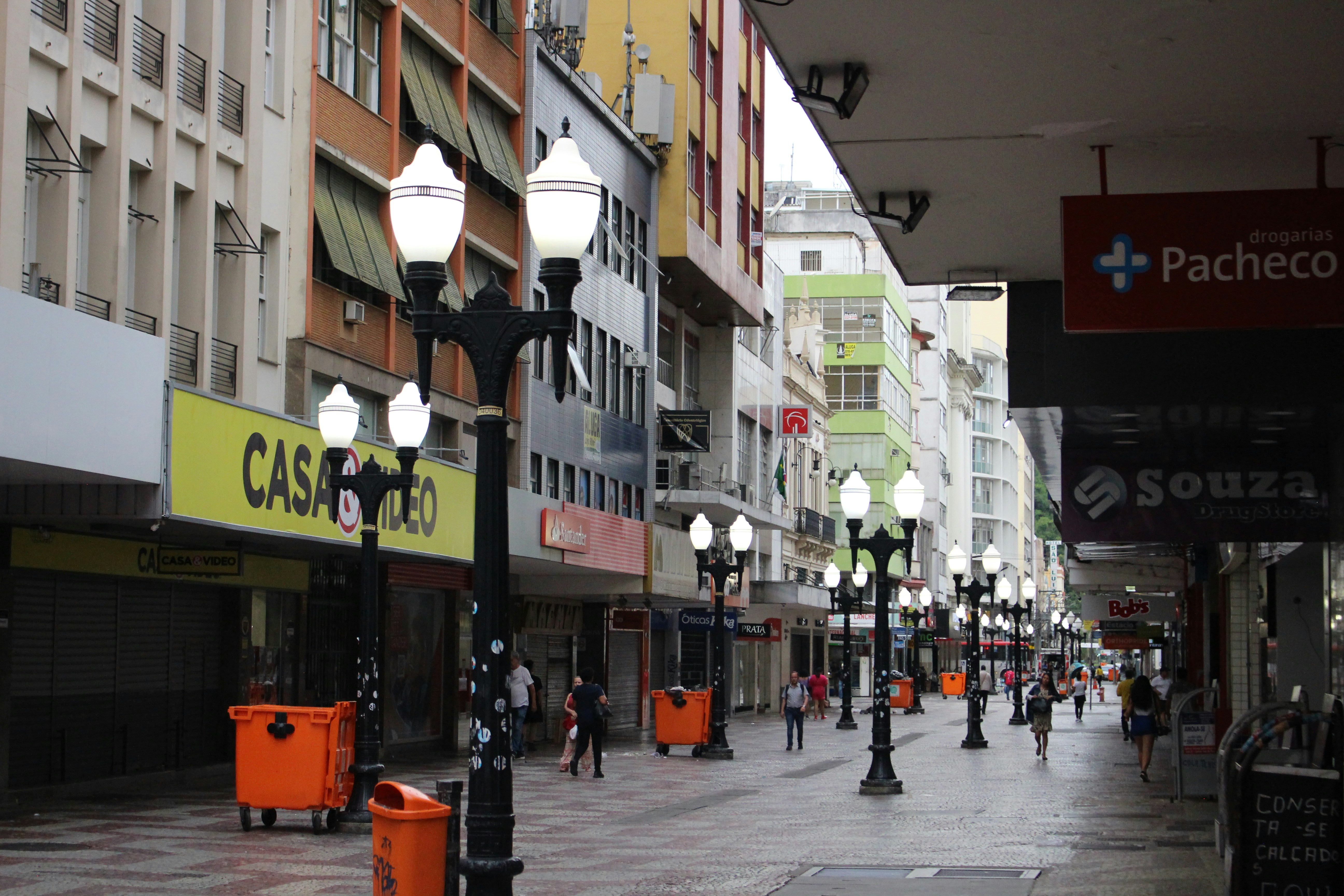 a city street filled with lots of tall buildings