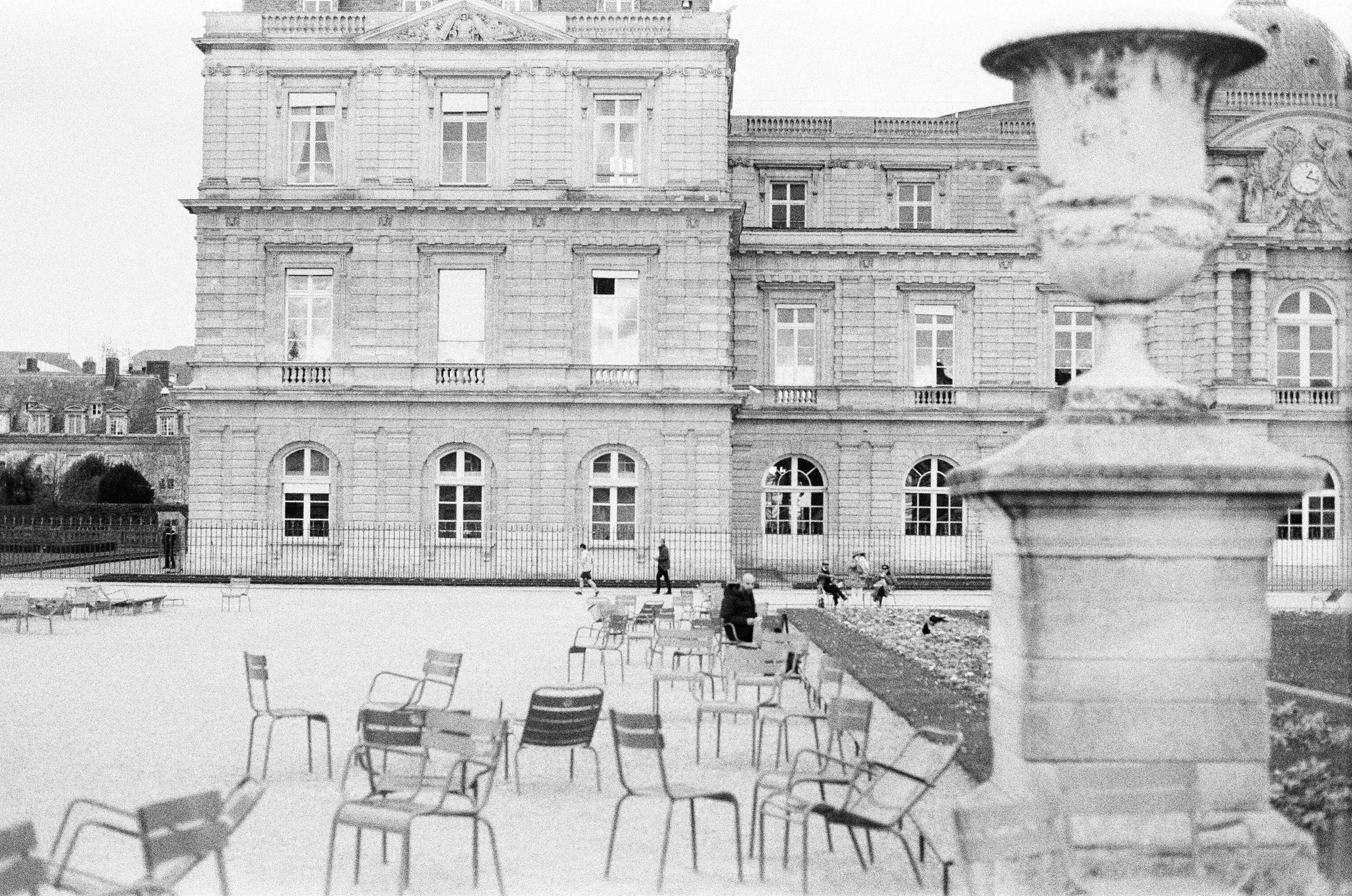 a black and white photo of a large building