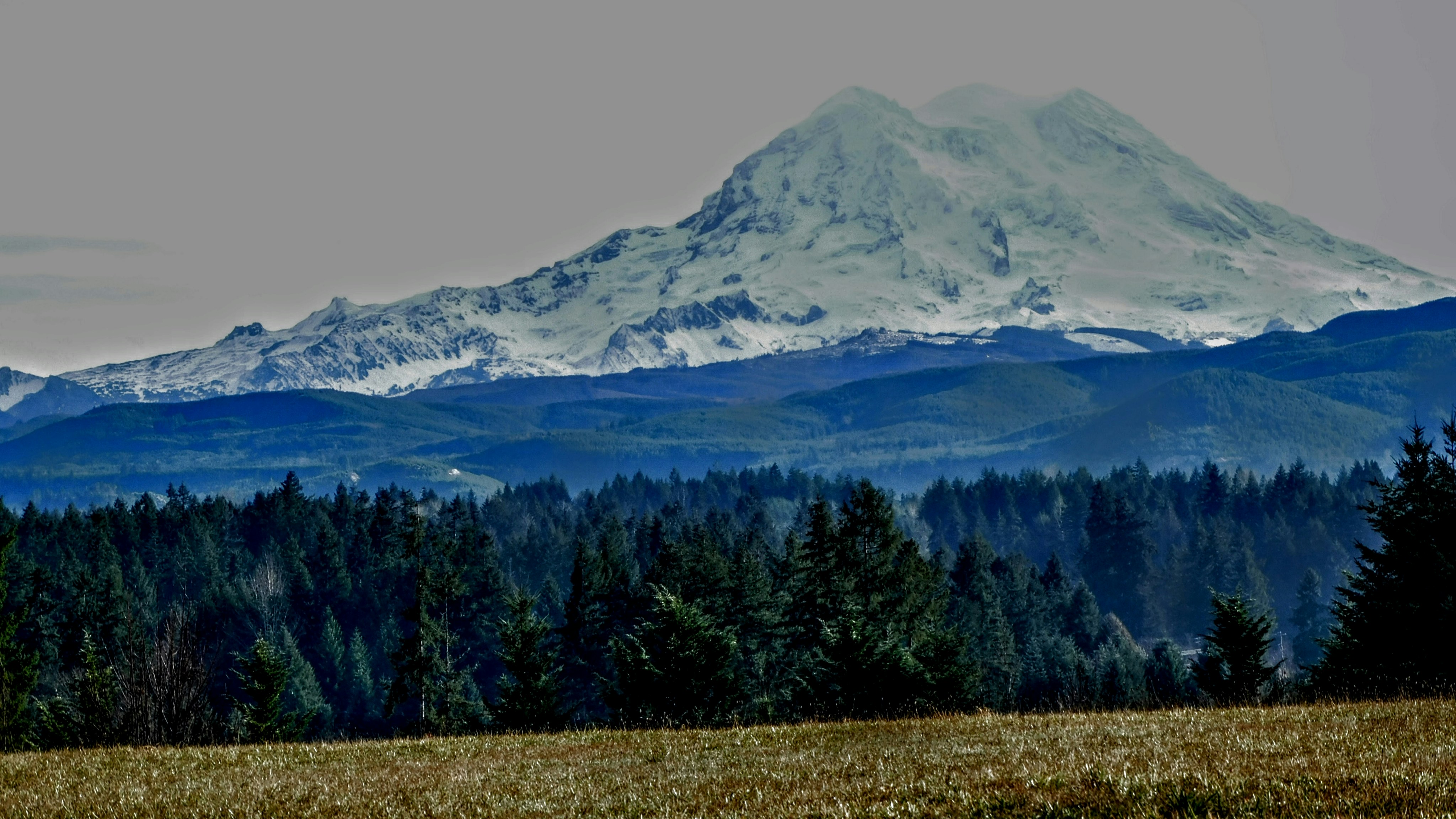 One glimpse of this photo makes it look like Mount Rainier is much closer than it actually is. In reality, from here, it's about an hour drive