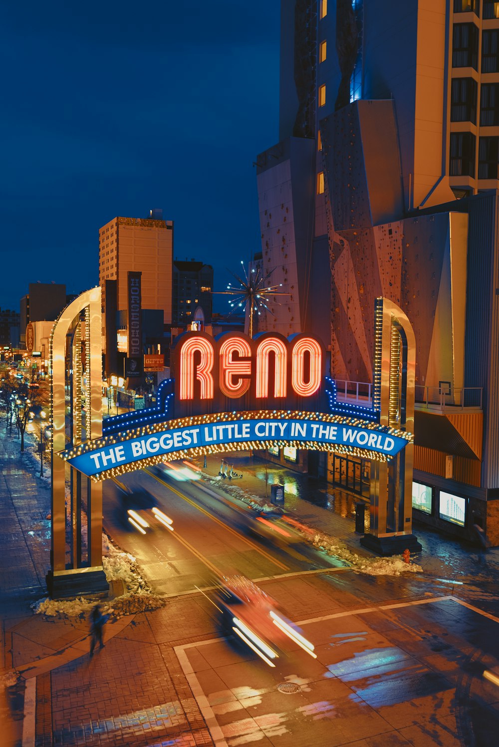 a neon sign that reads reno the biggest little city in the world