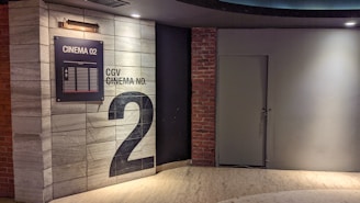 a room with a sign and a door