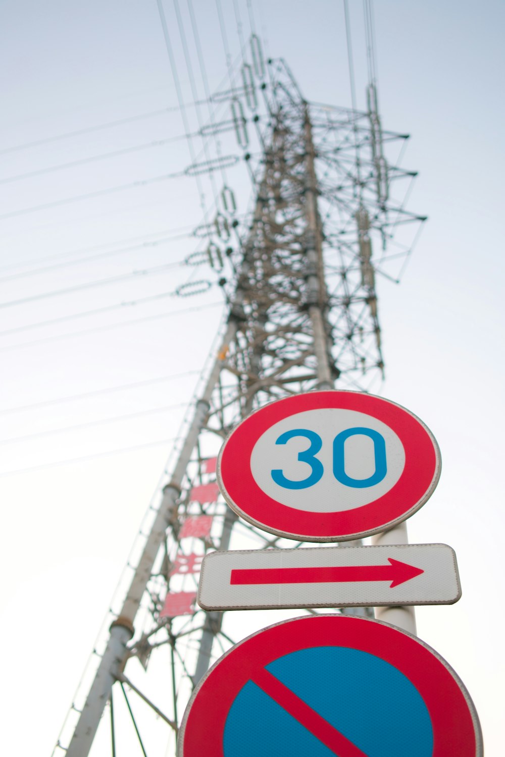 a pole with a couple of signs on top of it