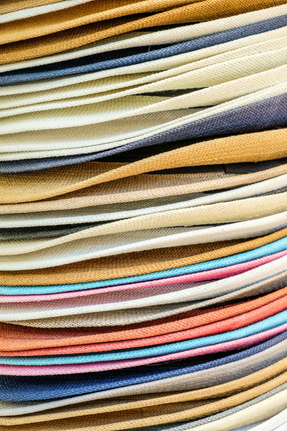 a pile of different colored papers stacked on top of each other