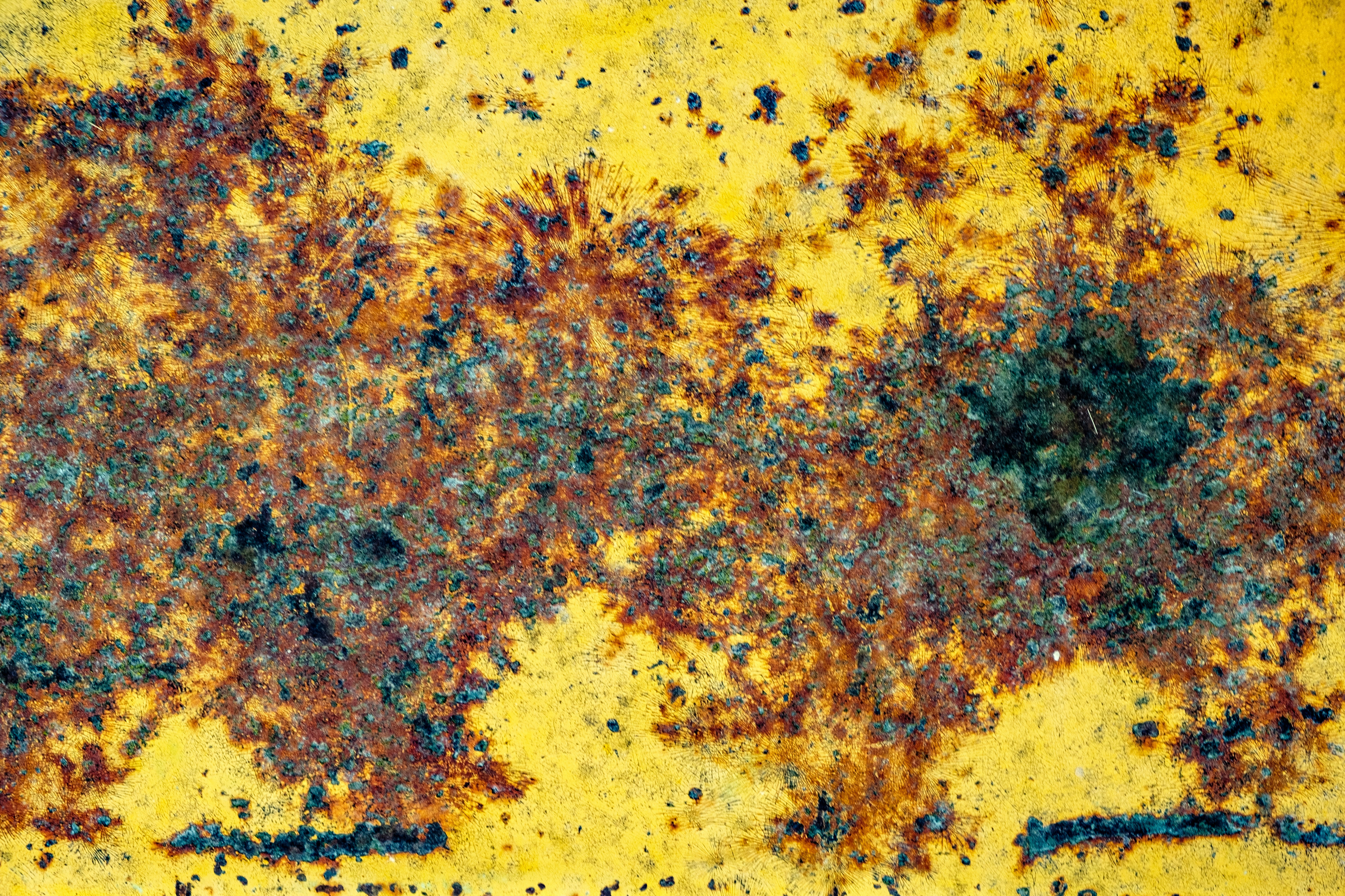 a rusted metal surface with lots of rust on it