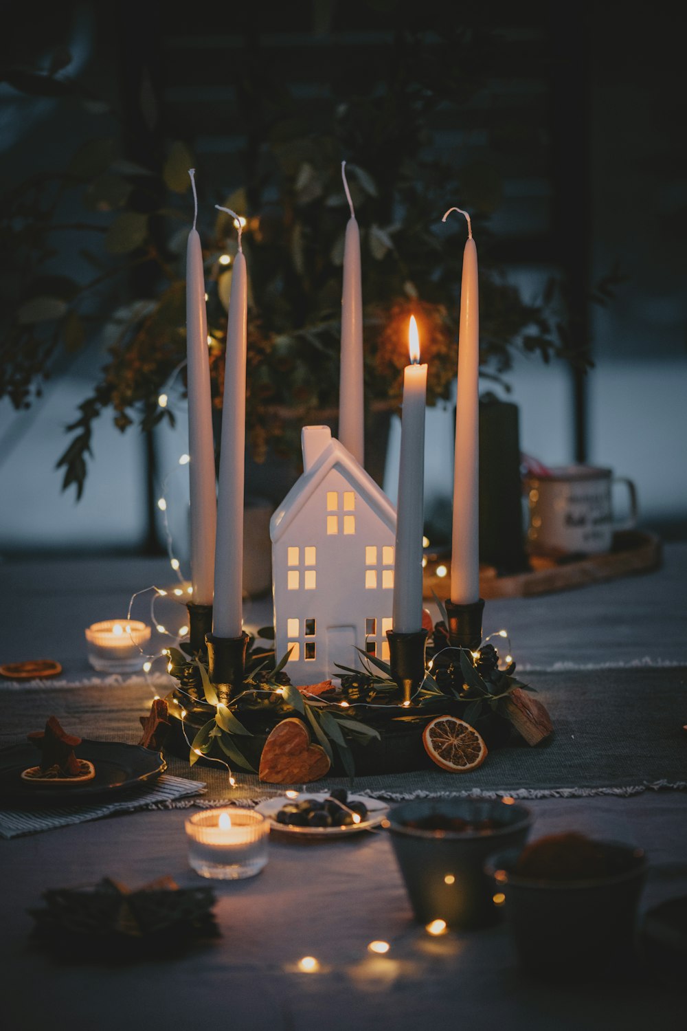 a group of candles sitting on top of a table