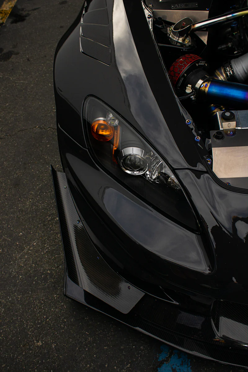 JDM tuner car with a body kit and stanced fitment