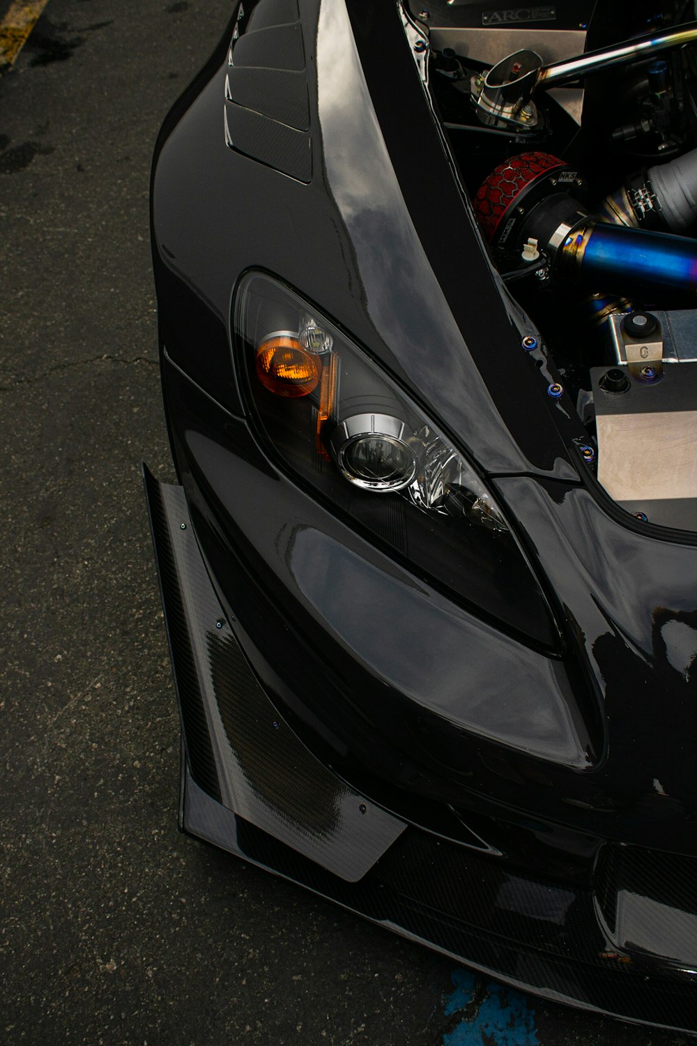 a close up of the front of a sports car