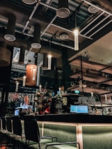 a restaurant with a lot of tables and chairs