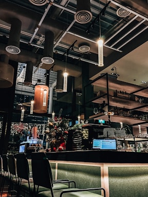 a restaurant with a lot of tables and chairs