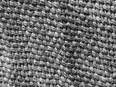 Close-up of sturdy fiberglass mesh fabric with fine weave texture