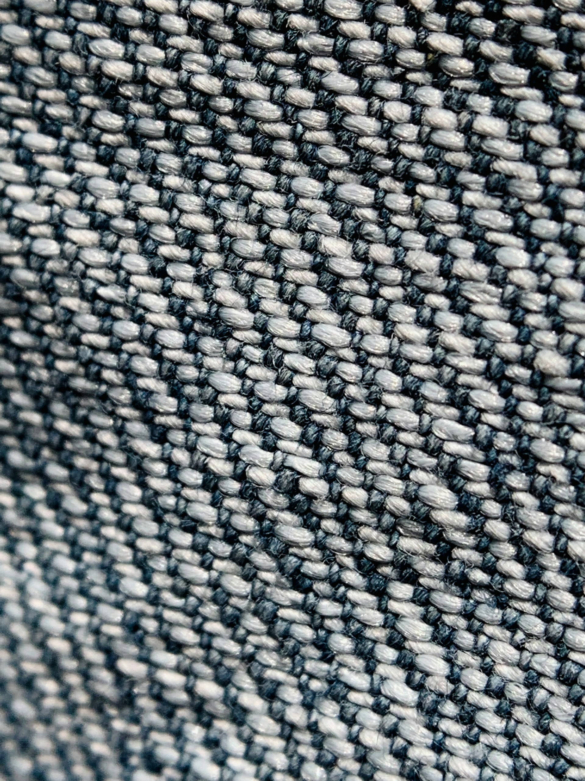 a close up of a blue and white checkered fabric