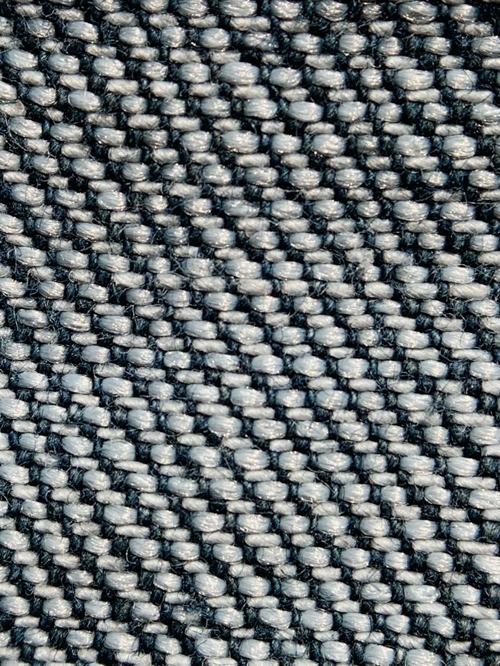 a close up of a black and white checkered fabric