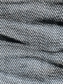Close-up of soft, durable denim fabric in natural colors.