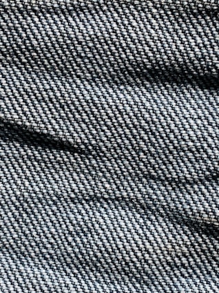 A close-up of unique denim details and textures.