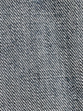 A close-up view of a textured fabric with a woven pattern. The fibers alternate between dark blue and white threads, creating a characteristic denim appearance.