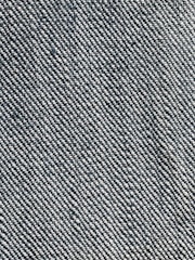 A close-up view of a woven fabric texture featuring a dense pattern of interlaced threads. The fabric appears sturdy and thick, with a prominent diagonal weave pattern, indicative of denim material.