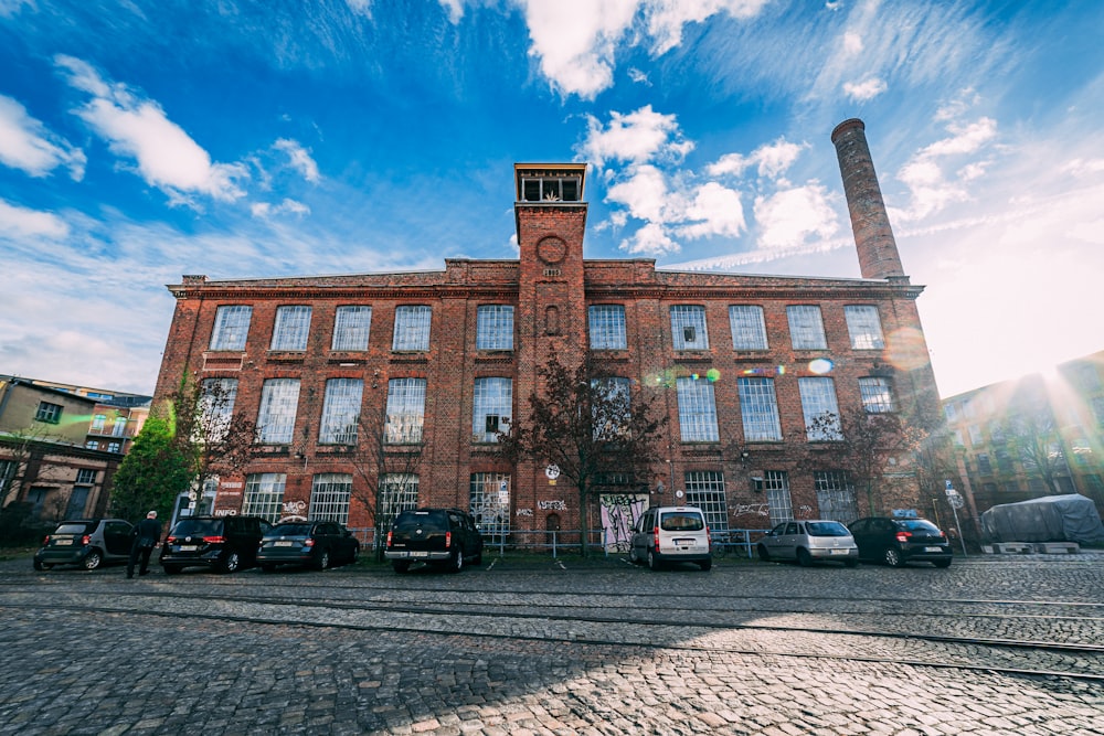 a large brick building with a clock tower