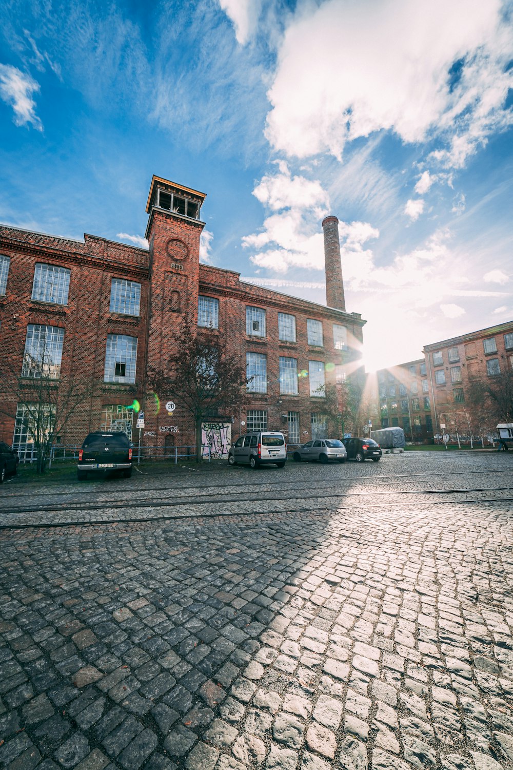 a brick building with a clock tower on top of it