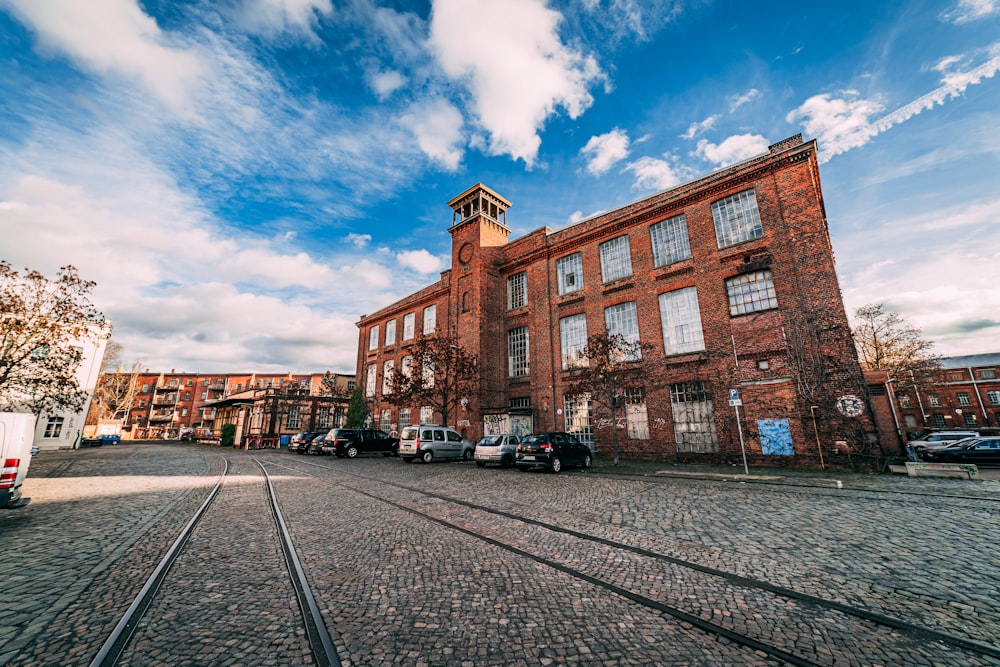 a brick building with a clock tower on top of it