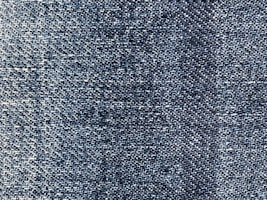 Close-up of soft denim fabric showcasing its texture.