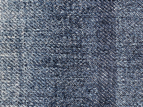 Close-up of soft denim fabric showcasing its texture.