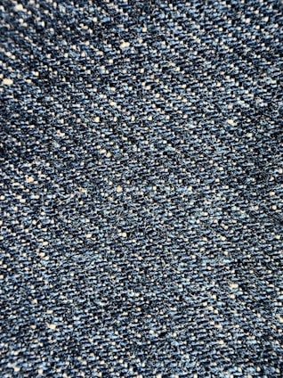 A vibrant image showcasing high-quality denim fabric rolls.