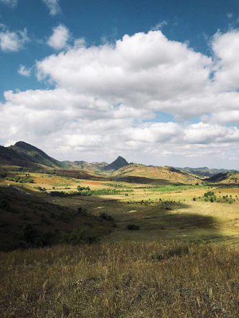 Panoramic mountain view over a vast, serene Catalan landscape with peaceful terrain