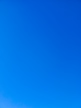 a group of people standing on top of a snow covered slope