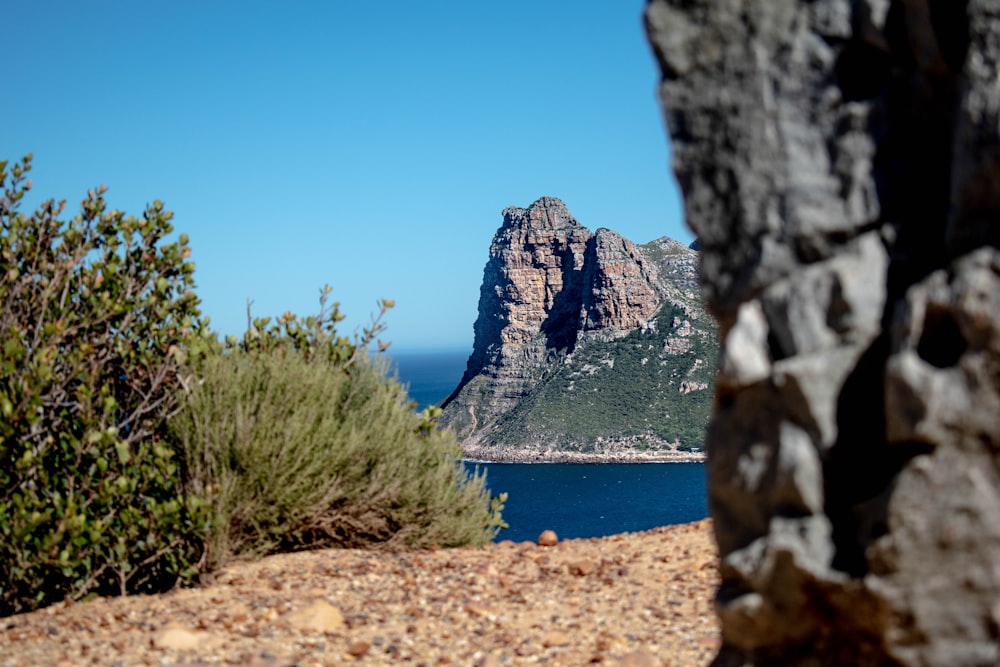 a view of a mountain and a body of water