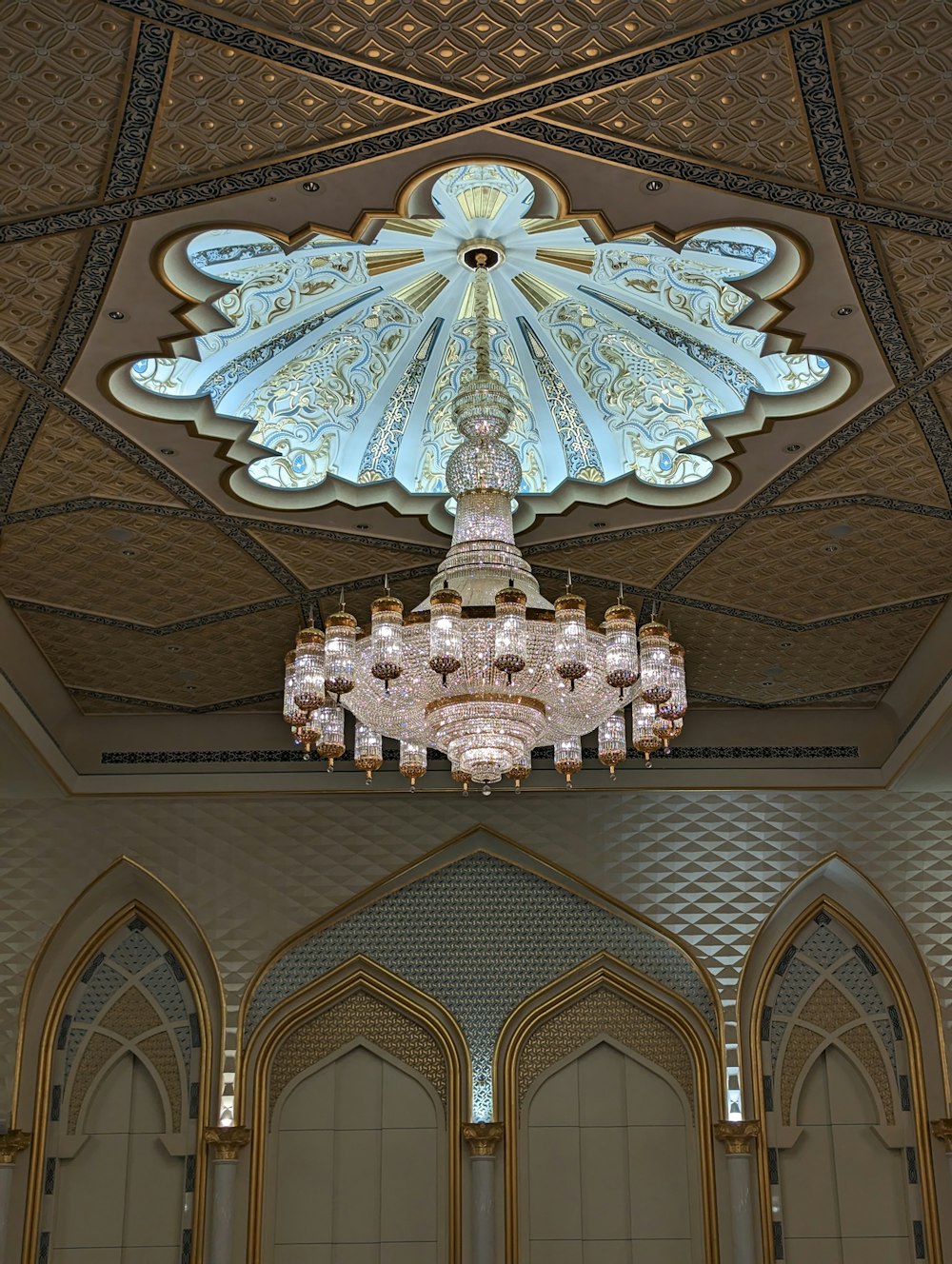 a chandelier hanging from the ceiling of a building