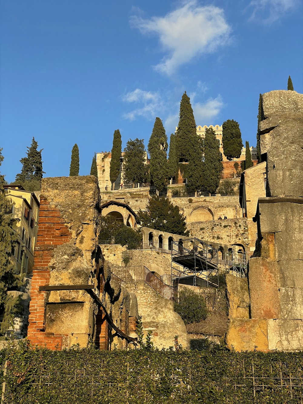 a castle like structure with trees on top of it