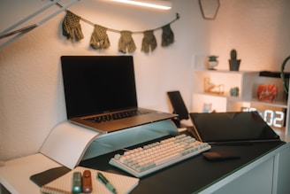 A cozy indoor scene showcasing a variety of tech gadgets and accessories neatly organized on a desk with warm lighting.