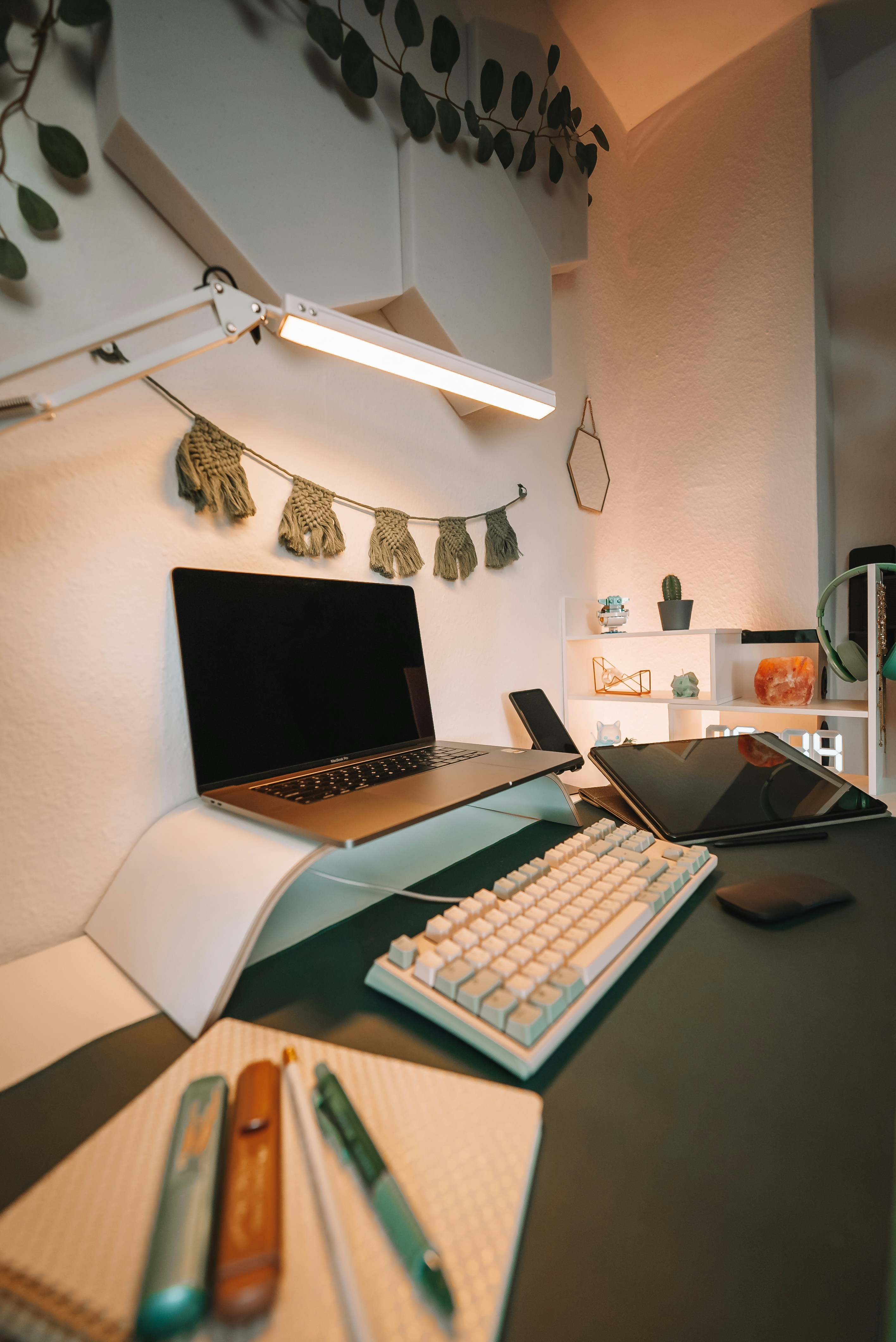 a laptop computer sitting on top of a desk