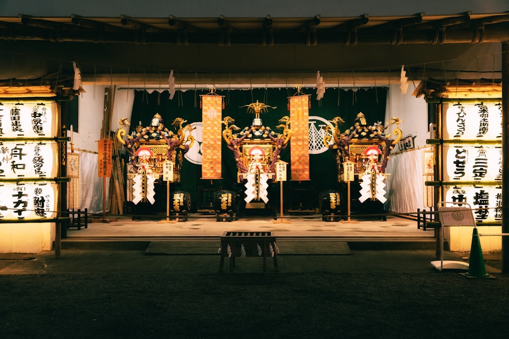 a stage set up for a performance with a bench in front of it