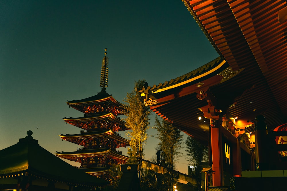 a tall building with a tower in the background