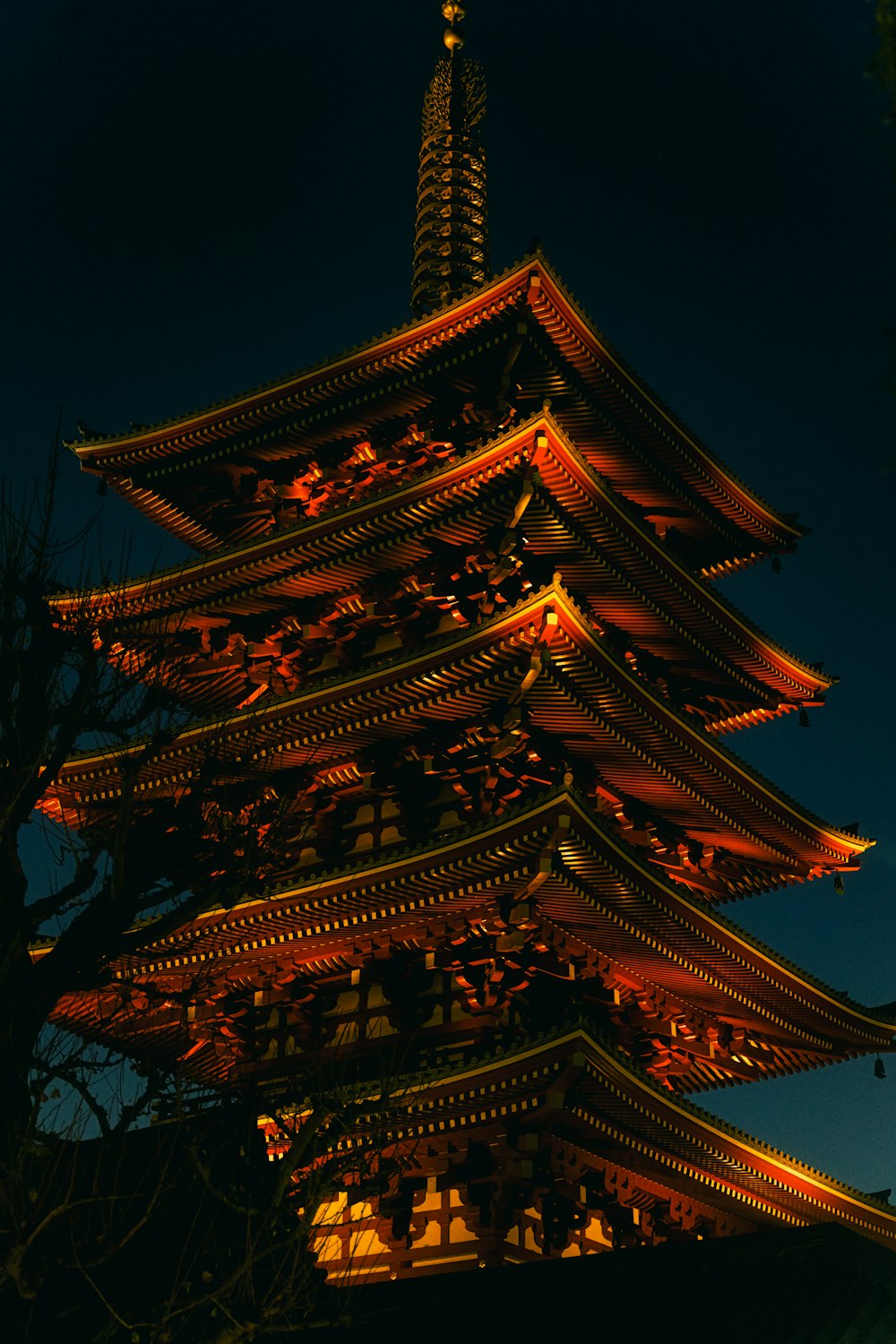 a tall building lit up in the night